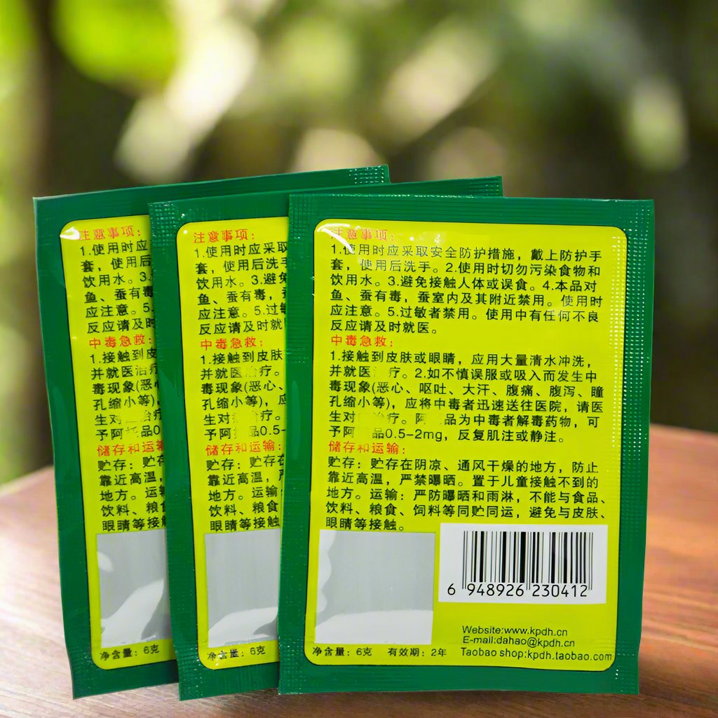 Packets of Effective Killing Cockroach Bait Powder Insect Roach Killer on display, showing product's black text and green packaging.